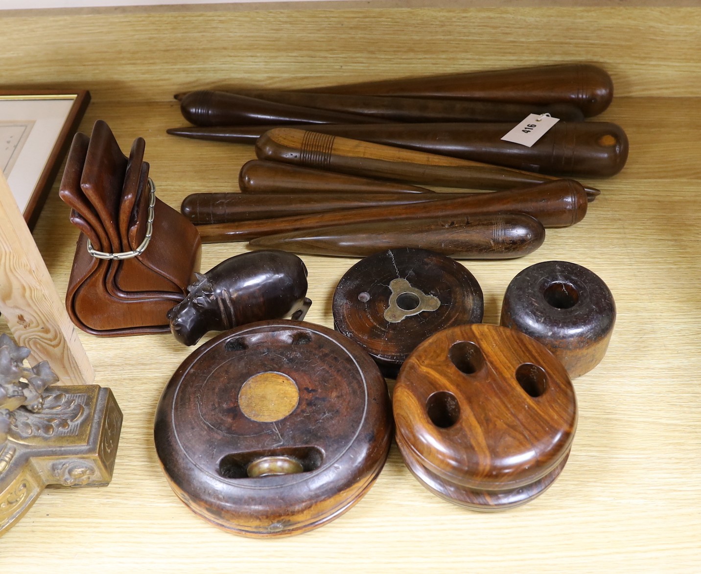 A collection of lignum vitae, rosewood etc. fids, pulley wheels etc